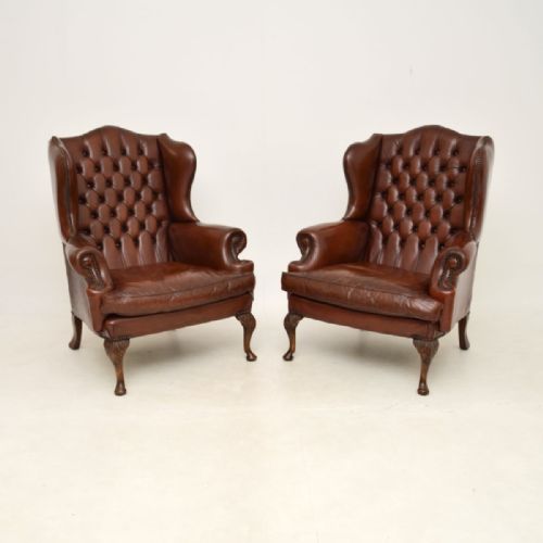 Pair of Antique Leather Wing Back Armchairs
