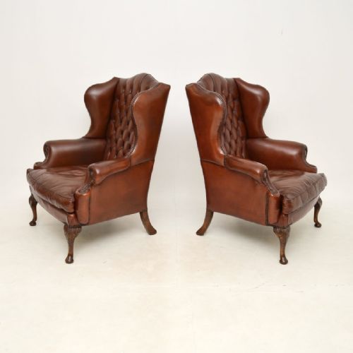 fig 1. Pair of Antique Leather Wing Back Armchairs
