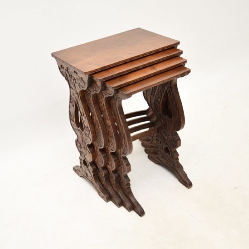 Antique Art Nouveau Carved Mahogany Nest of Four Tables
