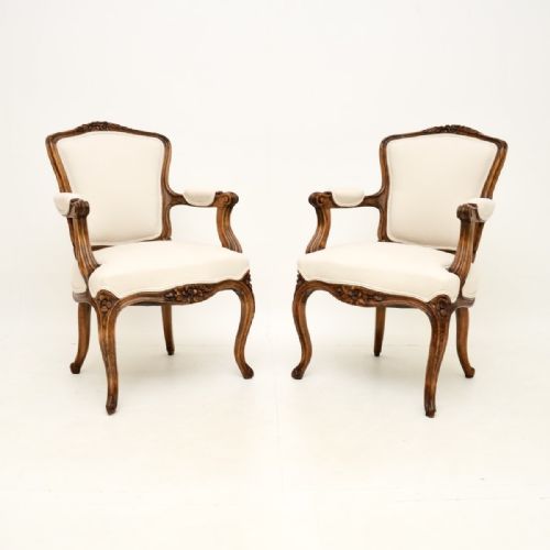 Pair of Antique French Carved Walnut Salon Armchairs
