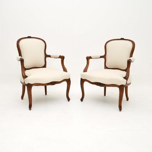 Pair of Antique French Walnut Salon Armchairs
