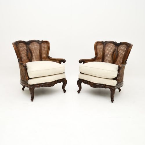 Pair of Antique French Walnut Bergère Armchairs
