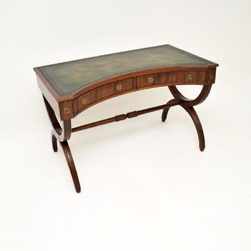 Antique Mahogany Concave Leather Top Desk
