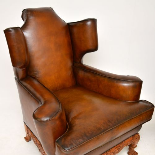 PAIR OF ANTIQUE LEATHER WING BACK ARMCHAIRS - ADDITIONAL PHOTO 3