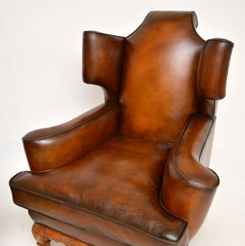 PAIR OF ANTIQUE LEATHER WING BACK ARMCHAIRS - ADDITIONAL PHOTO 4