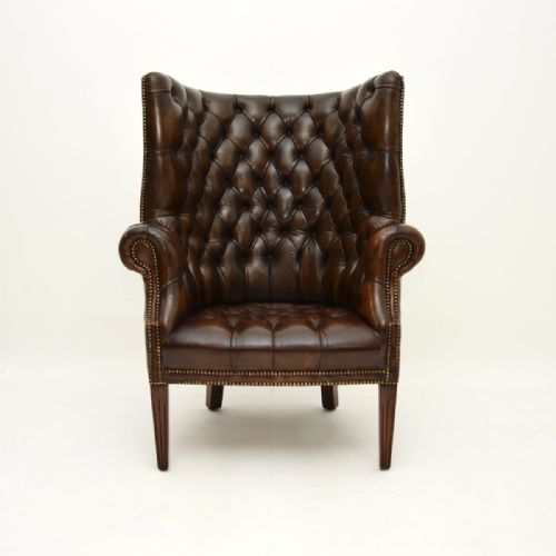 fig 1. Antique Leather Barrel Back Wing Armchair
