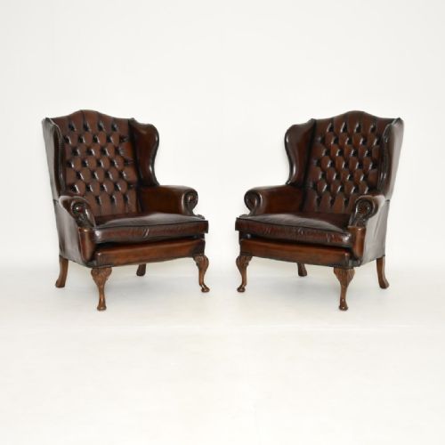 Pair of Antique Leather Wing Back Armchairs

