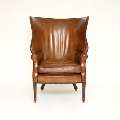 fig 1. Antique Leather Barrel Back Wing Armchair