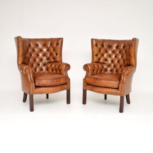 fig 1. Pair of Antique Leather Barrel Back Wing Armchairs