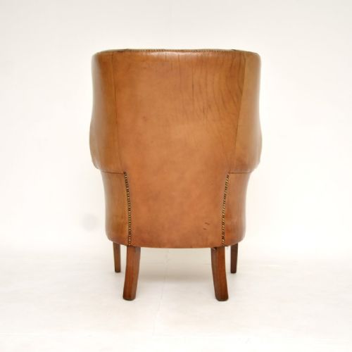 fig 1. Antique Leather Barrel Back Wing Armchair