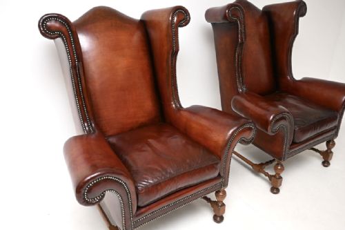 PAIR OF ANTIQUE LEATHER WING BACK ARMCHAIRS - ADDITIONAL PHOTO 6