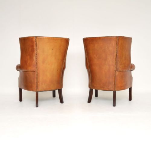 PAIR OF ANTIQUE LEATHER BARREL BACK WING ARMCHAIRS - ADDITIONAL PHOTO 1