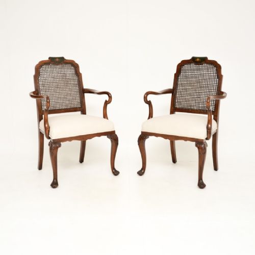 PAIR OF ANTIQUE EDWARDIAN LACQUERED WALNUT AND CANE ARMCHAIRS