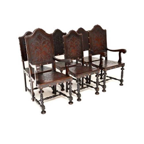 SET OF SIX ANTIQUE PORTUGUESE EMBOSSED LEATHER AND WALNUT DINING CHAIRS