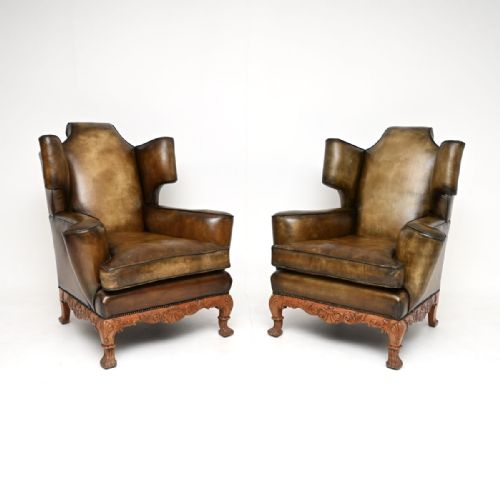 Pair of Antique Leather Wing Back Armchairs
