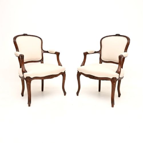 Pair of Antique French Walnut Salon Armchairs

