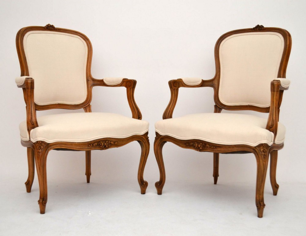 Pair of Antique French Carved Walnut Salon Armchairs