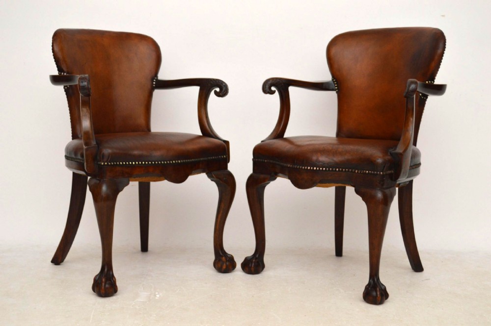 Pair of Antique Leather & Walnut Eagle Head Armchairs
