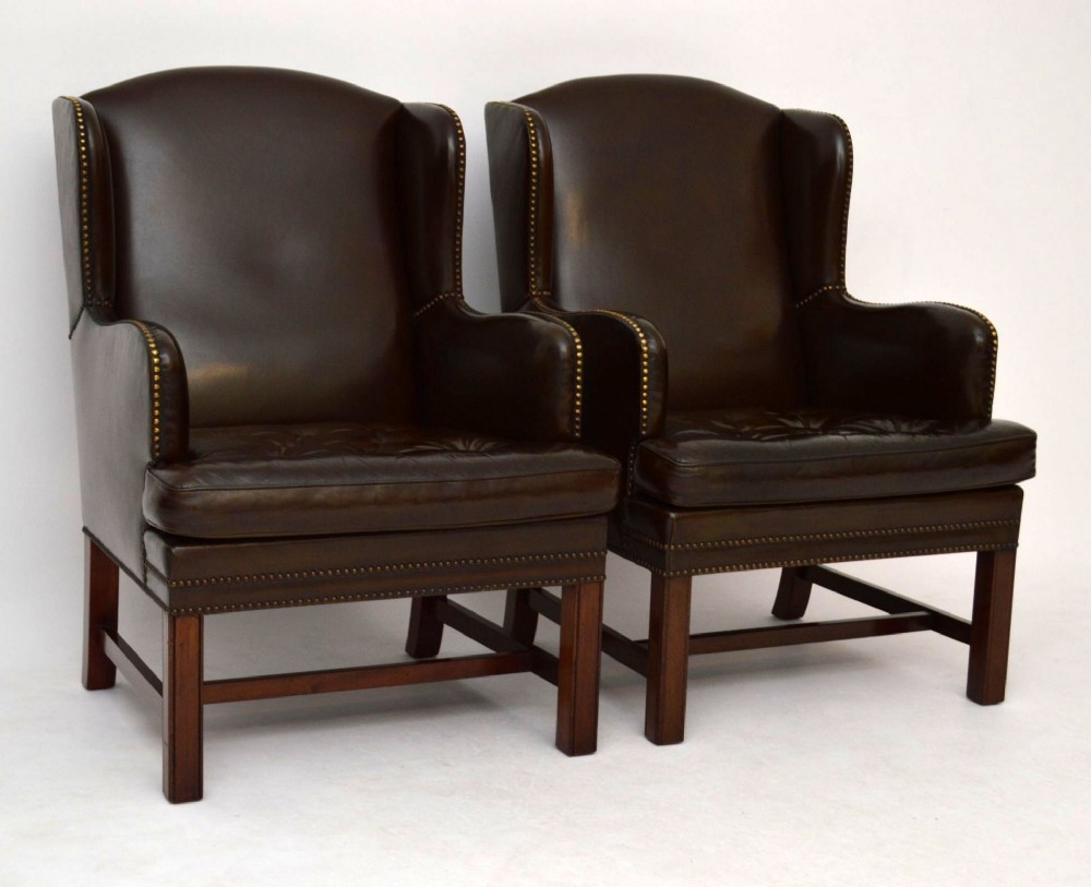 Pair of Antique Leather Wing Armchairs