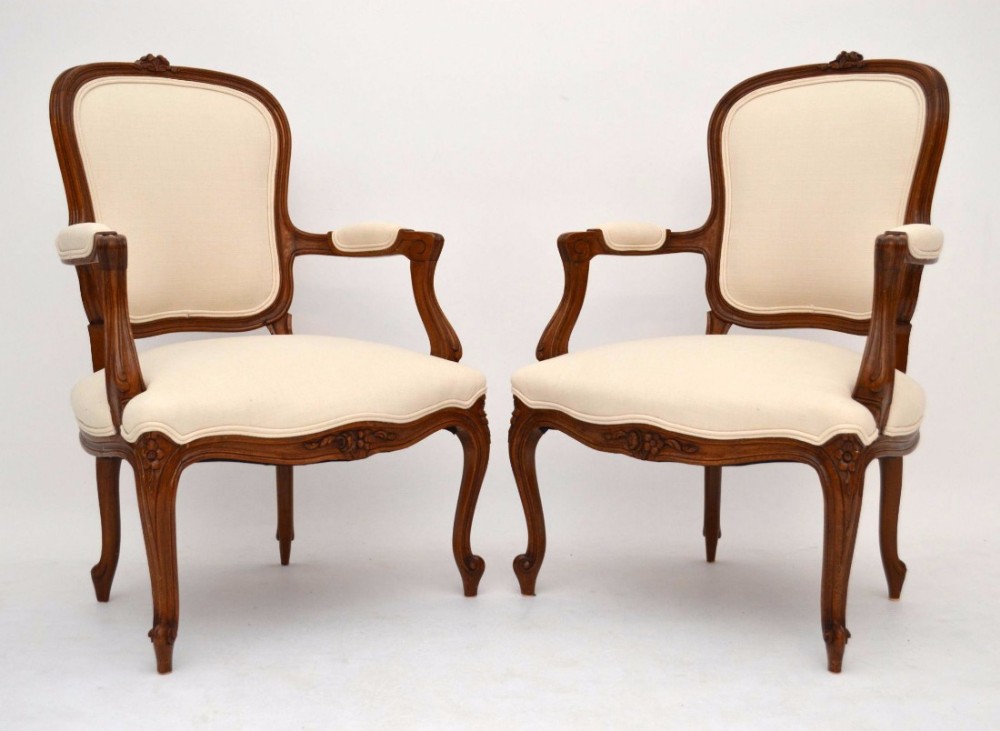 Pair of Antique French Carved Salon Cream Armchairs