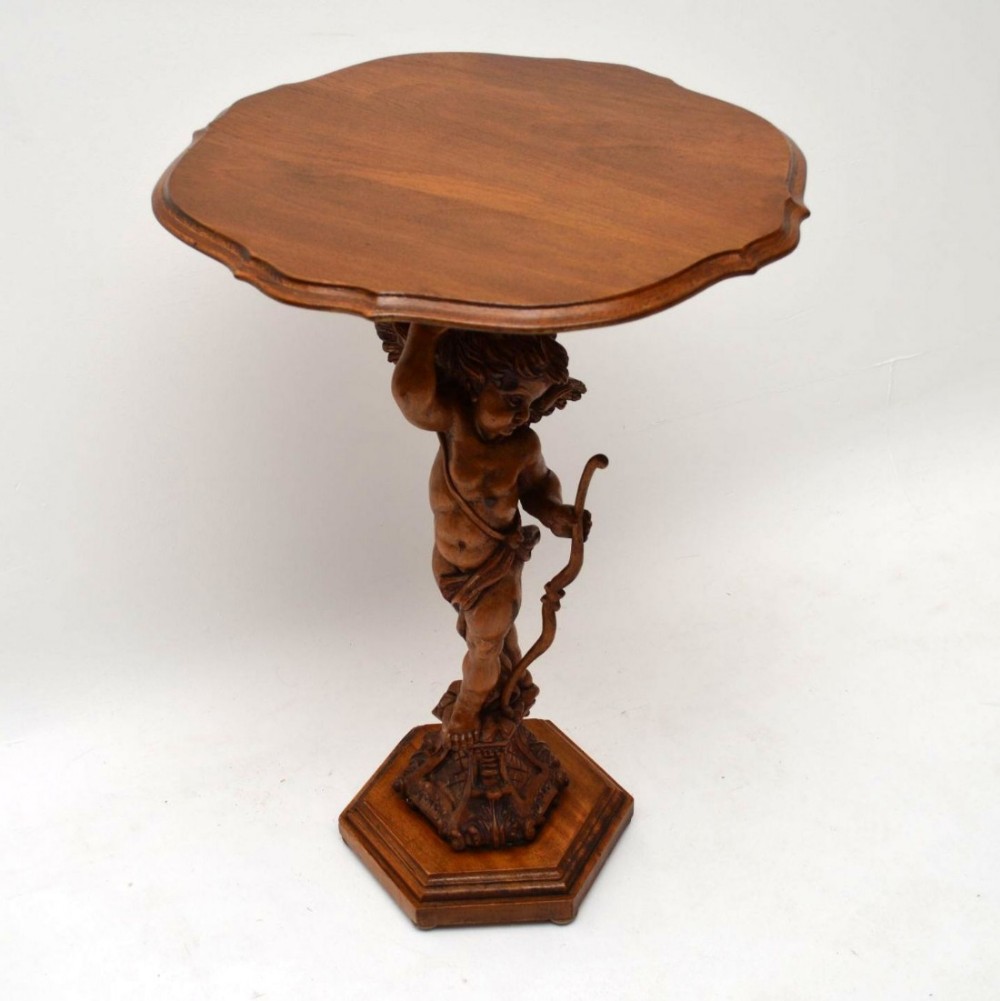Antique Carved Cherub Mounted Table