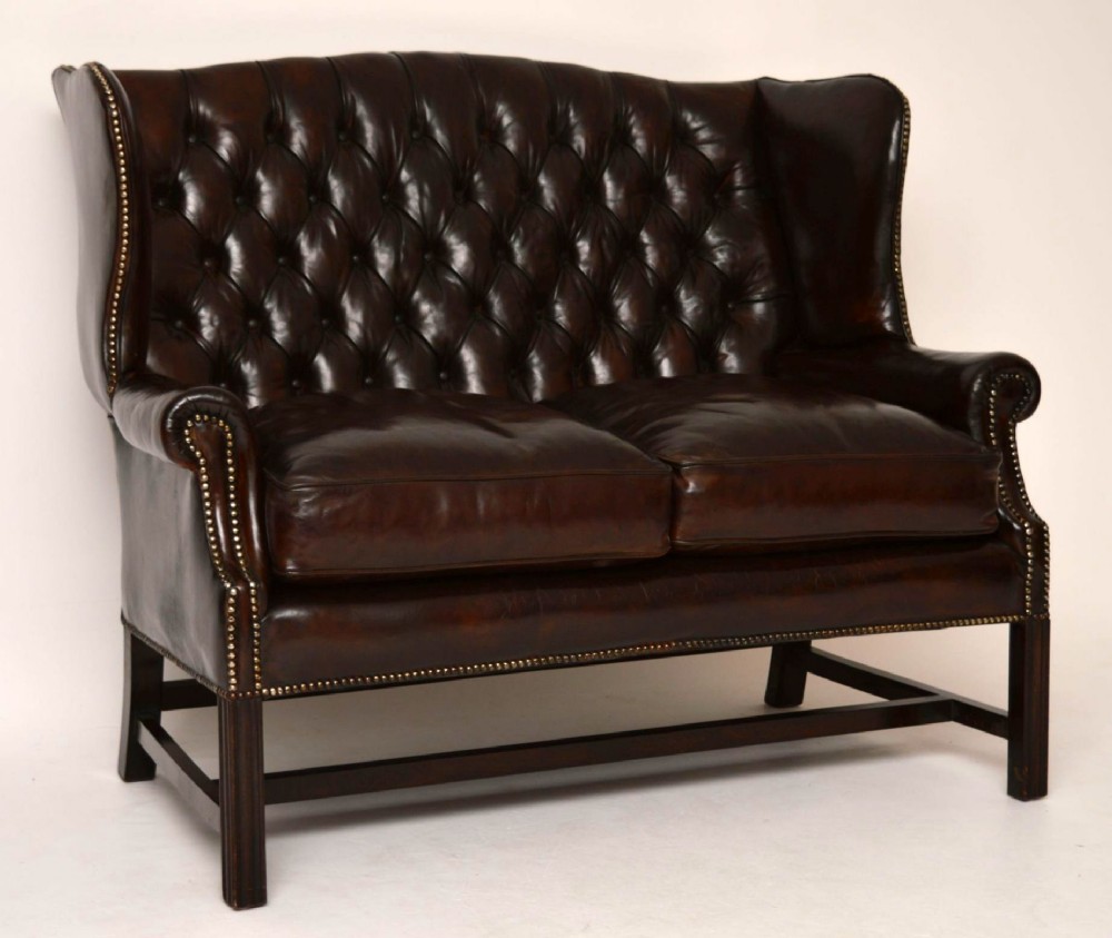 Antique Deep Buttoned Leather Wing Back Sofa