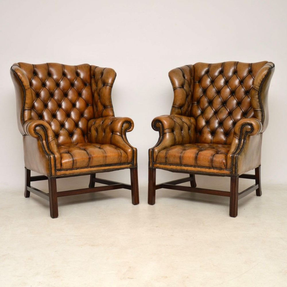 Pair of Antique Leather Wing Back Armchairs