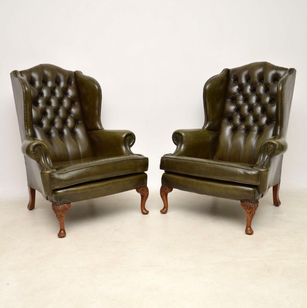 Pair of Antique Deep Buttoned Leather Wing Back Armchairs 