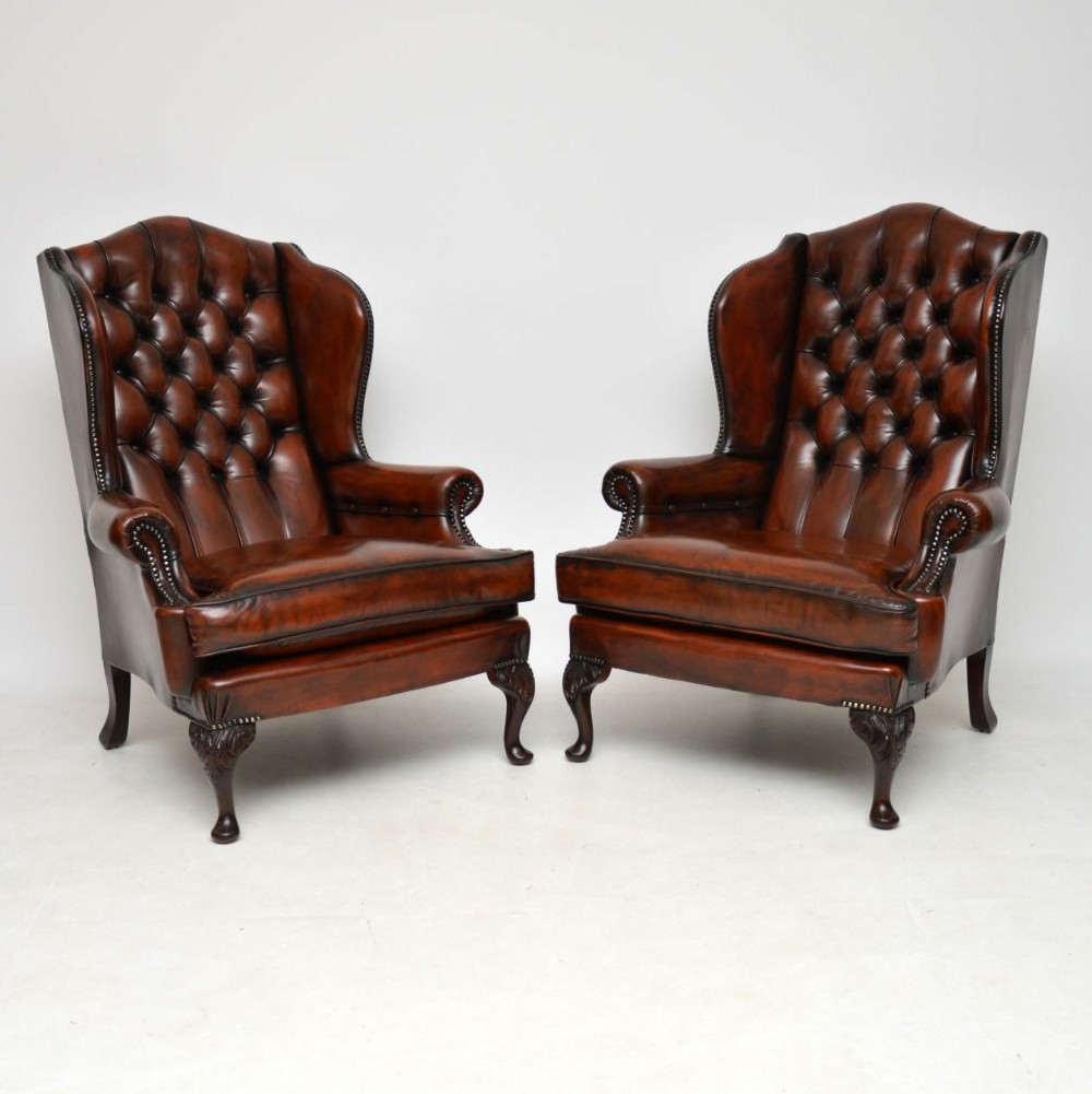  Pair of Antique Leather Wing Back Armchairs 