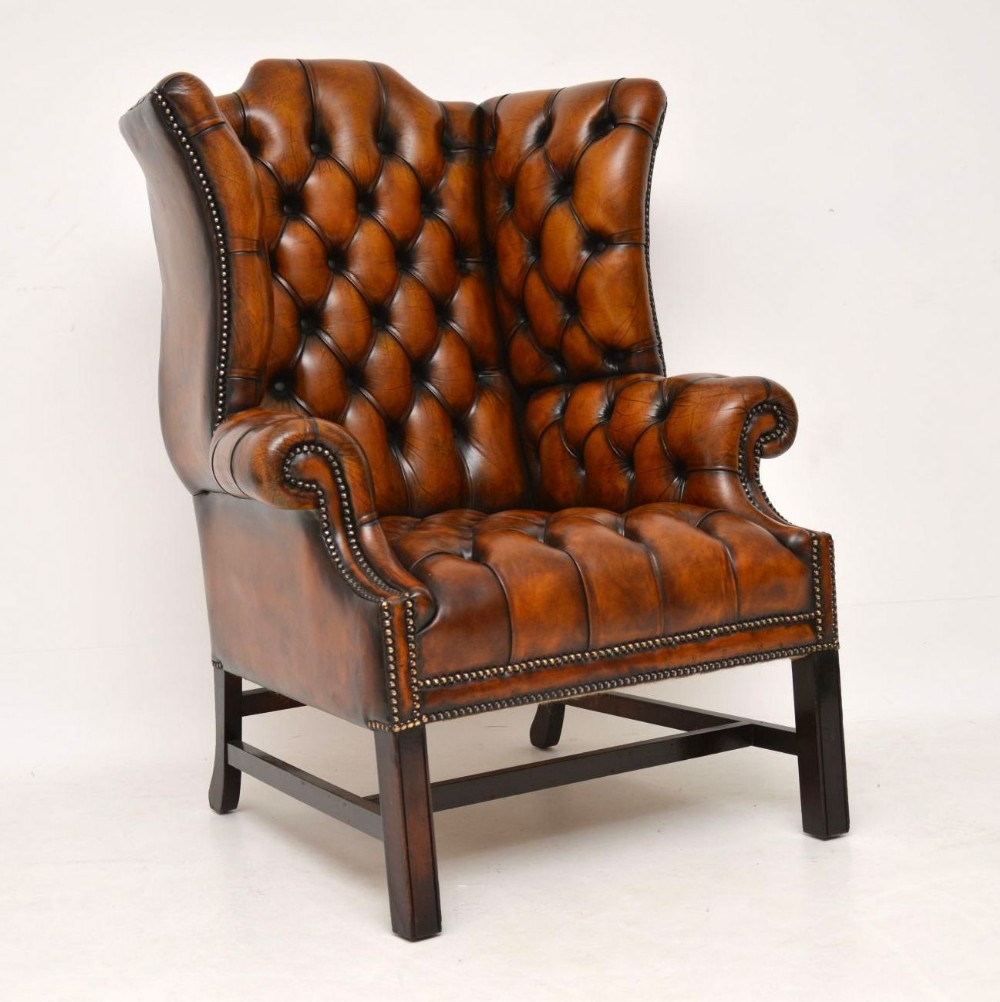 Antique Deep Buttoned Leather Wing Back Armchair
