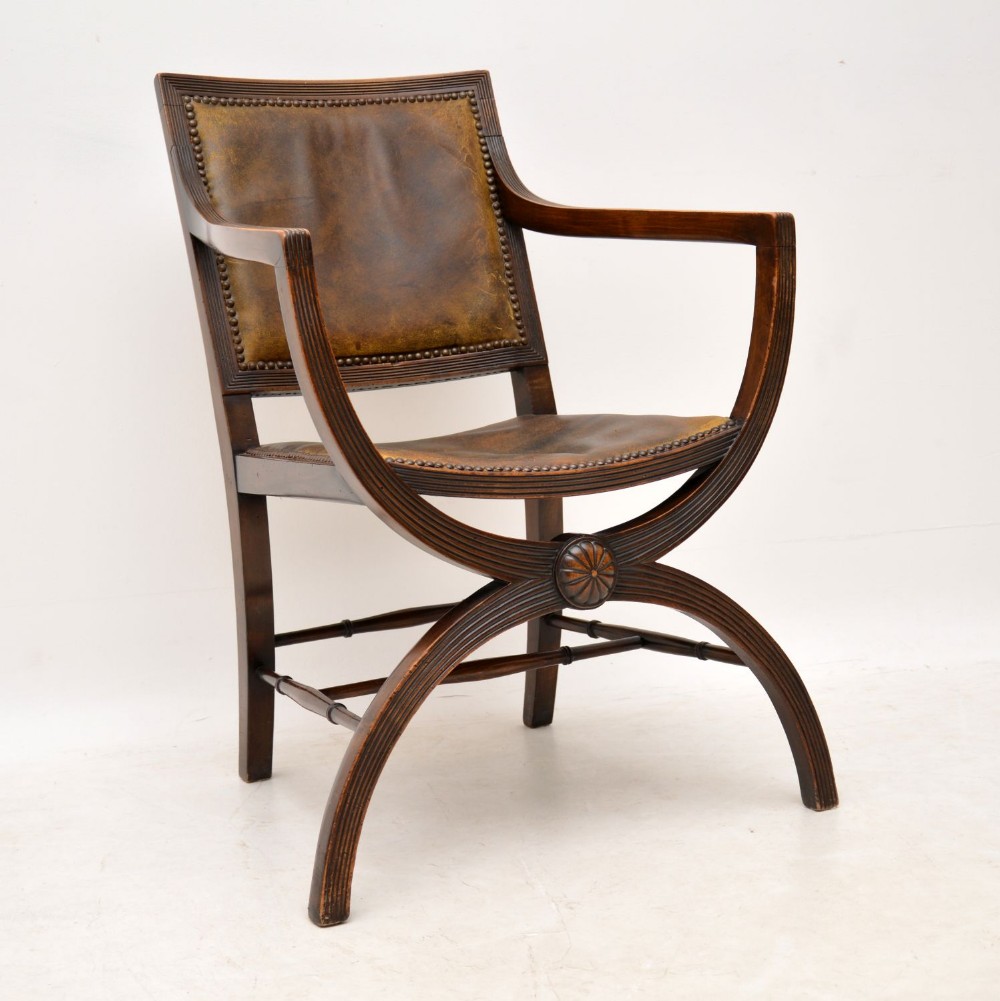 Antique Leather & Mahogany X Frame Armchair