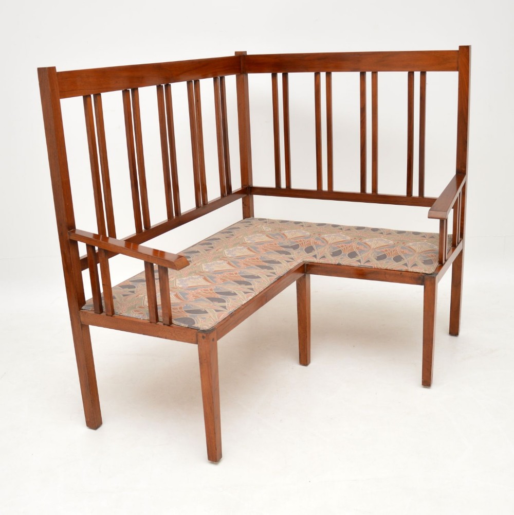 Antique Arts & Crafts Solid Walnut Corner Settee from Liberty of London