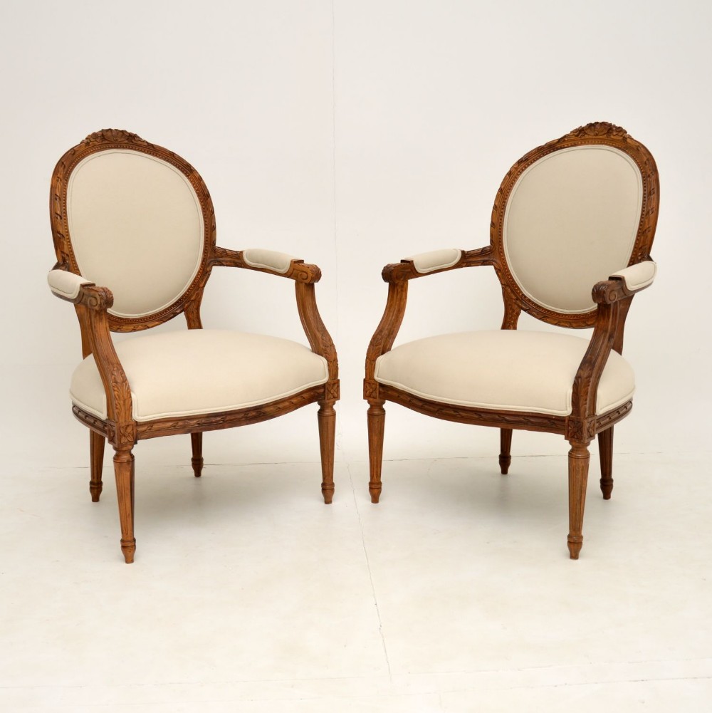 Pair of Antique French Walnut Salon Armchairs
