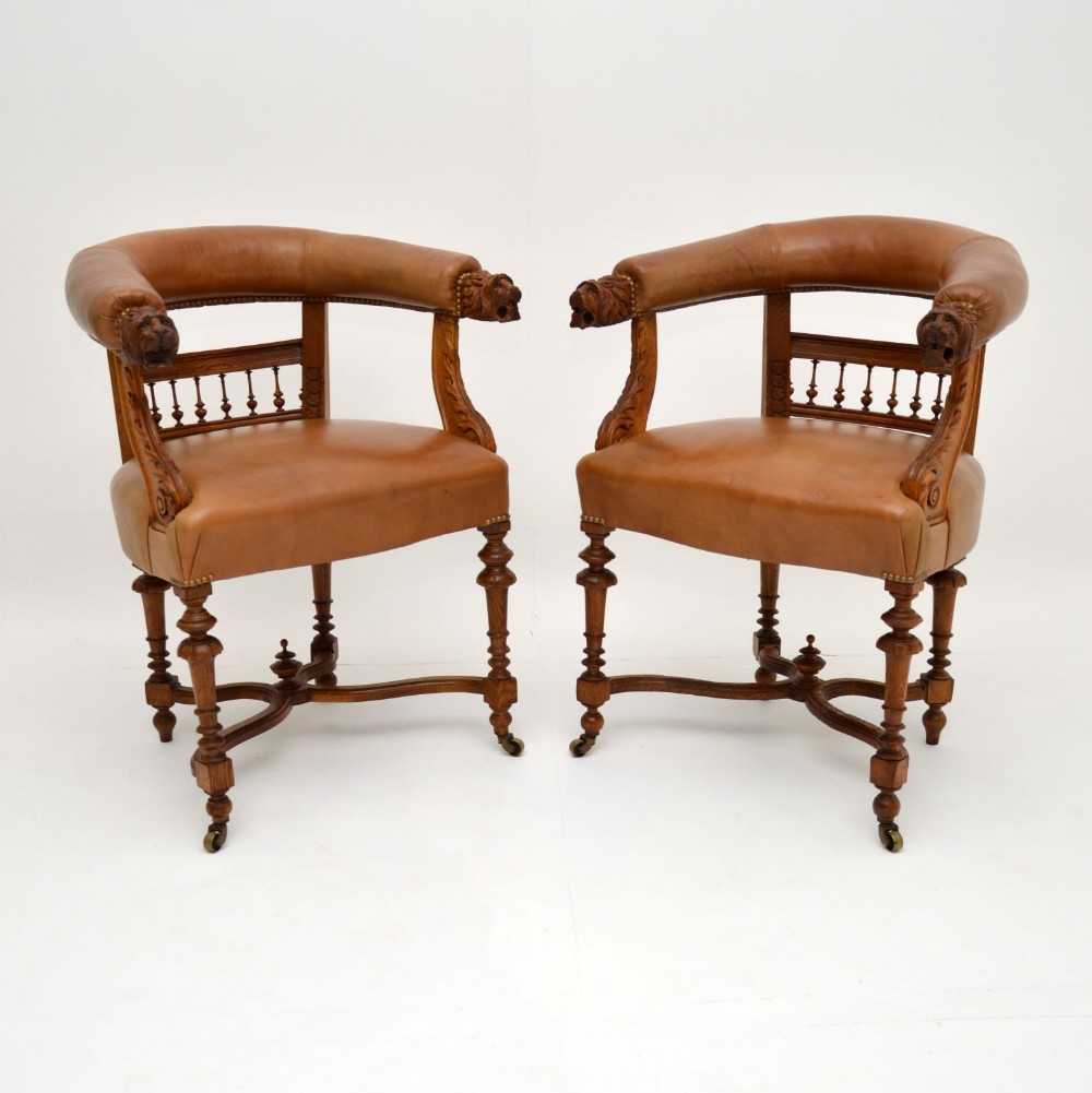 Pair of Antique Leather & Carved Oak Armchairs