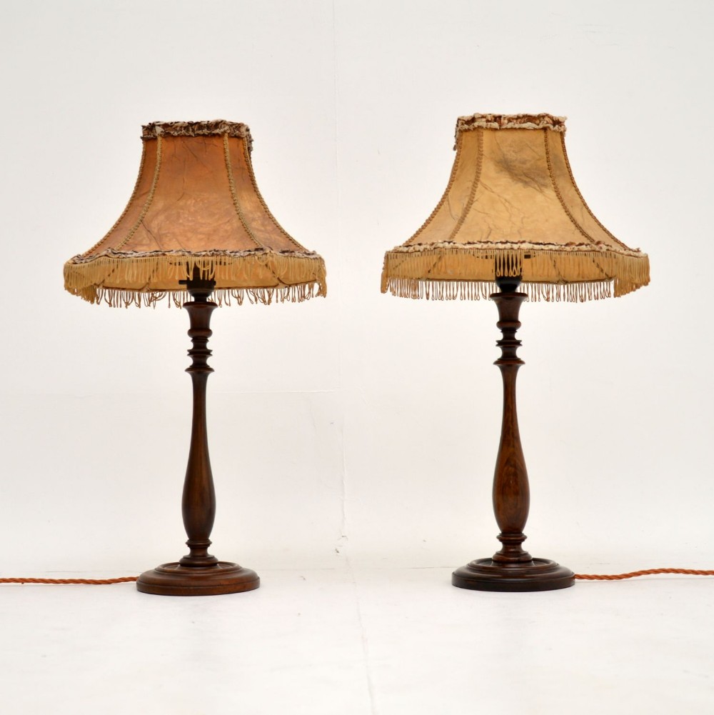 Pair of Antique Walnut Table Lamps with Parchment Shades
