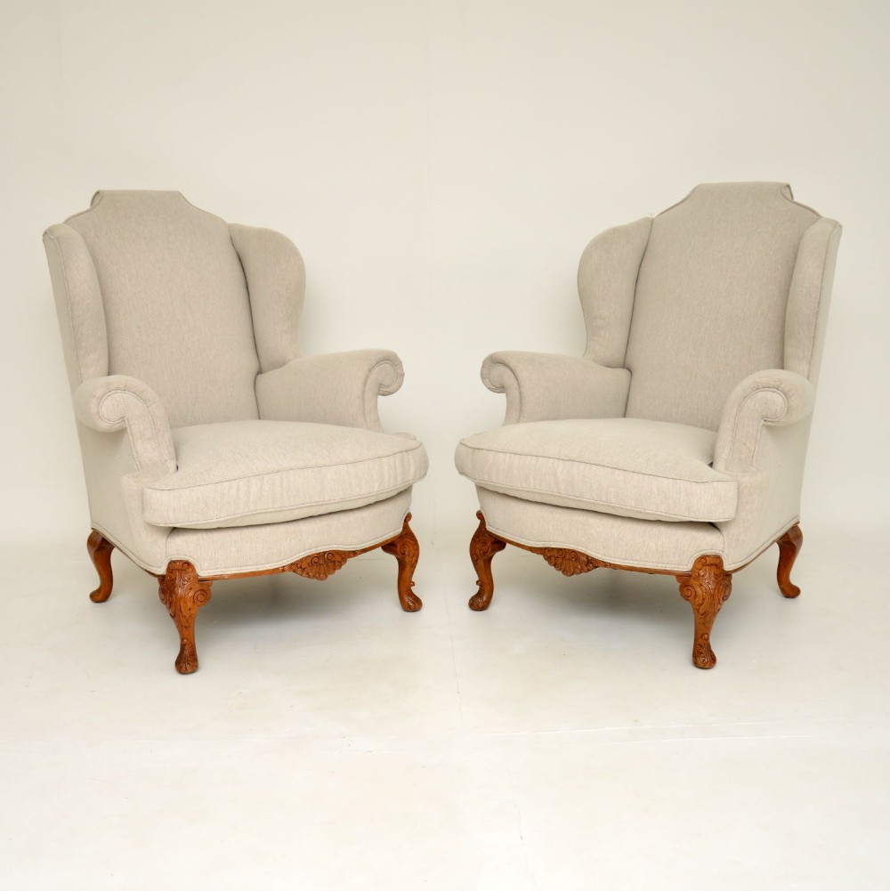 Pair of Antique Carved Walnut Wing Back Armchairs