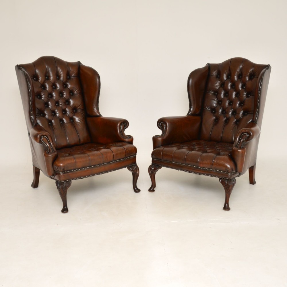 Pair of Antique Leather Wing Back Armchairs