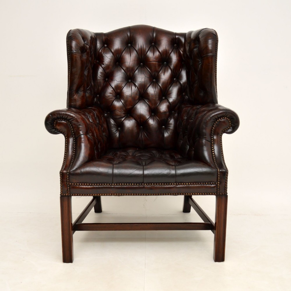 Antique Deep Buttoned Leather Wing Back Armchair