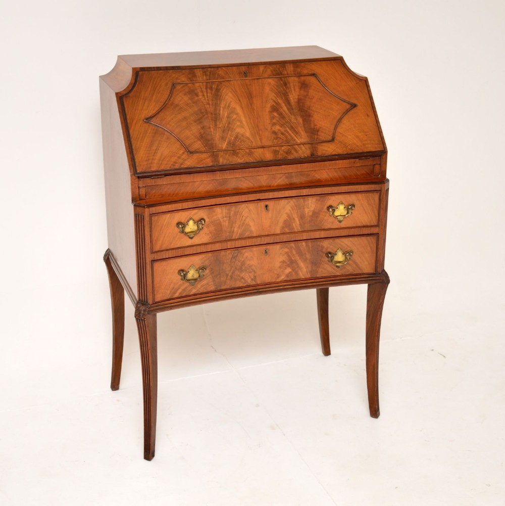 Antique Concave Shaped Mahogany Bureau on Sabre Legs