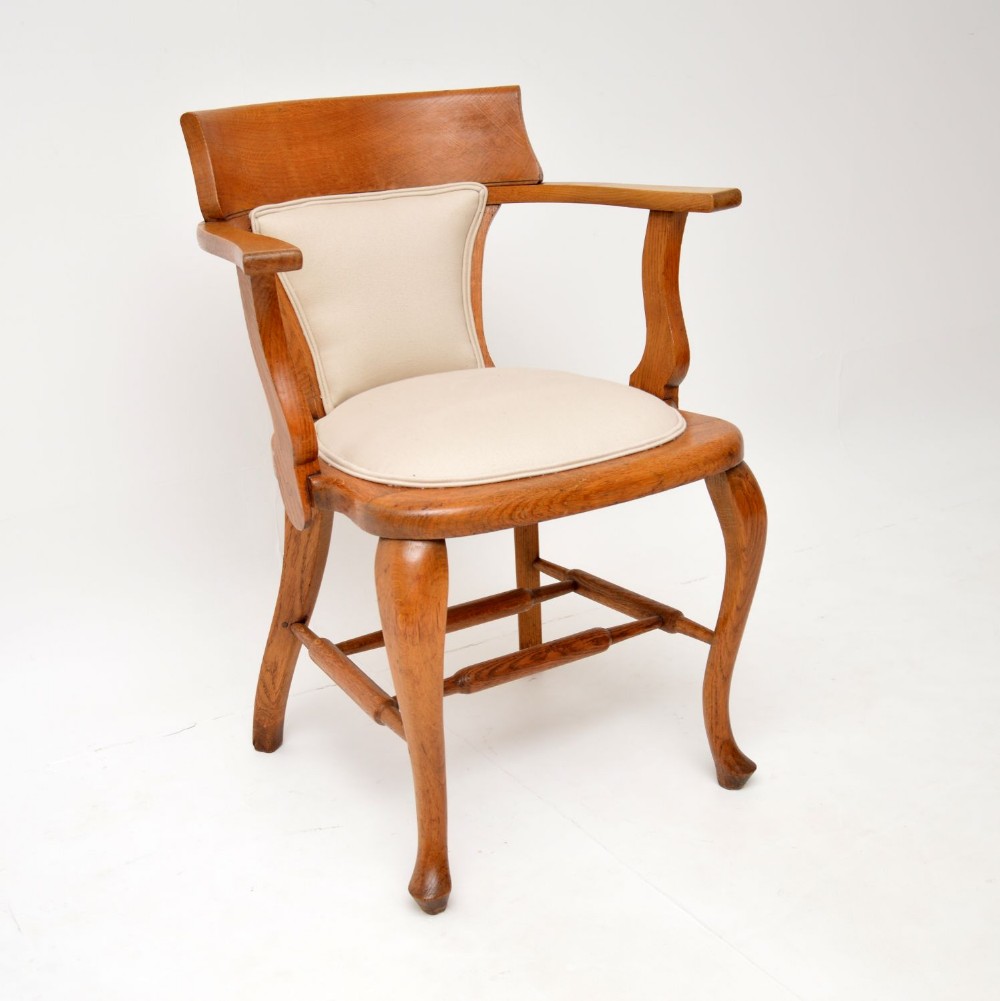 Antique Golden Oak Captains Desk Chair