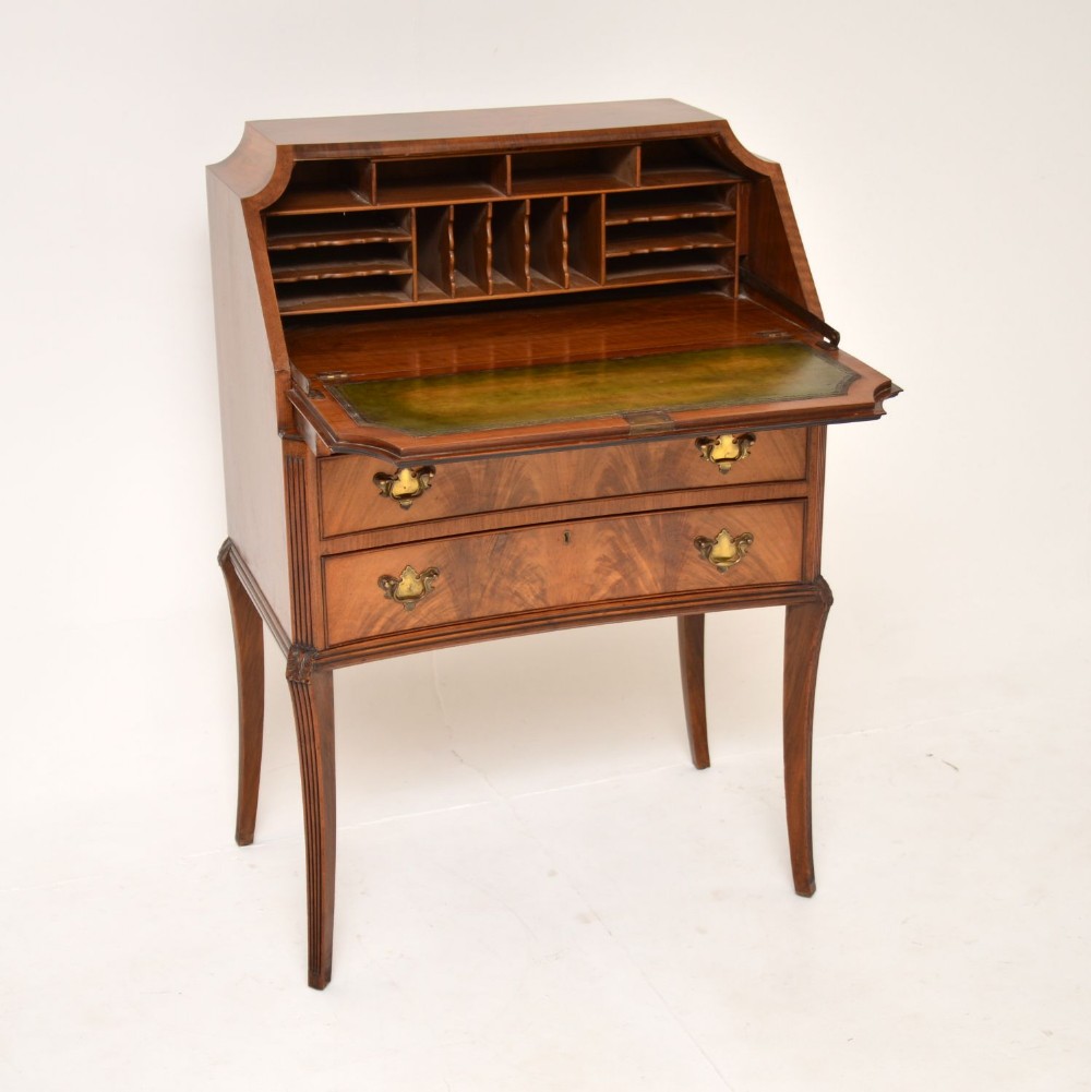 Antique Concave Shaped Mahogany Bureau on Sabre Legs
