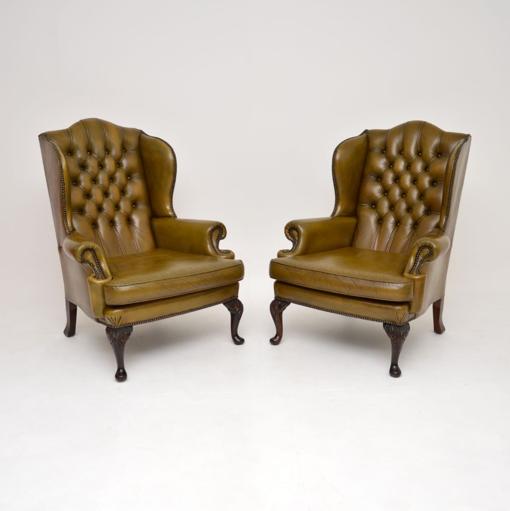 Pair of Antique Leather Wing Back Armchairs