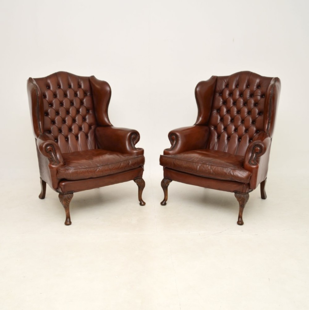 Pair of Antique Leather Wing Back Armchairs
