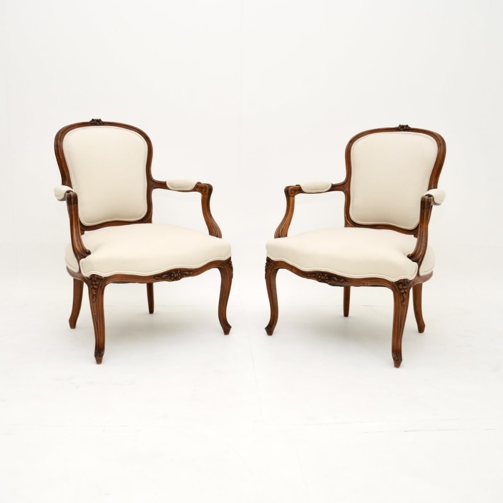 Pair of Antique French Walnut Salon Armchairs
