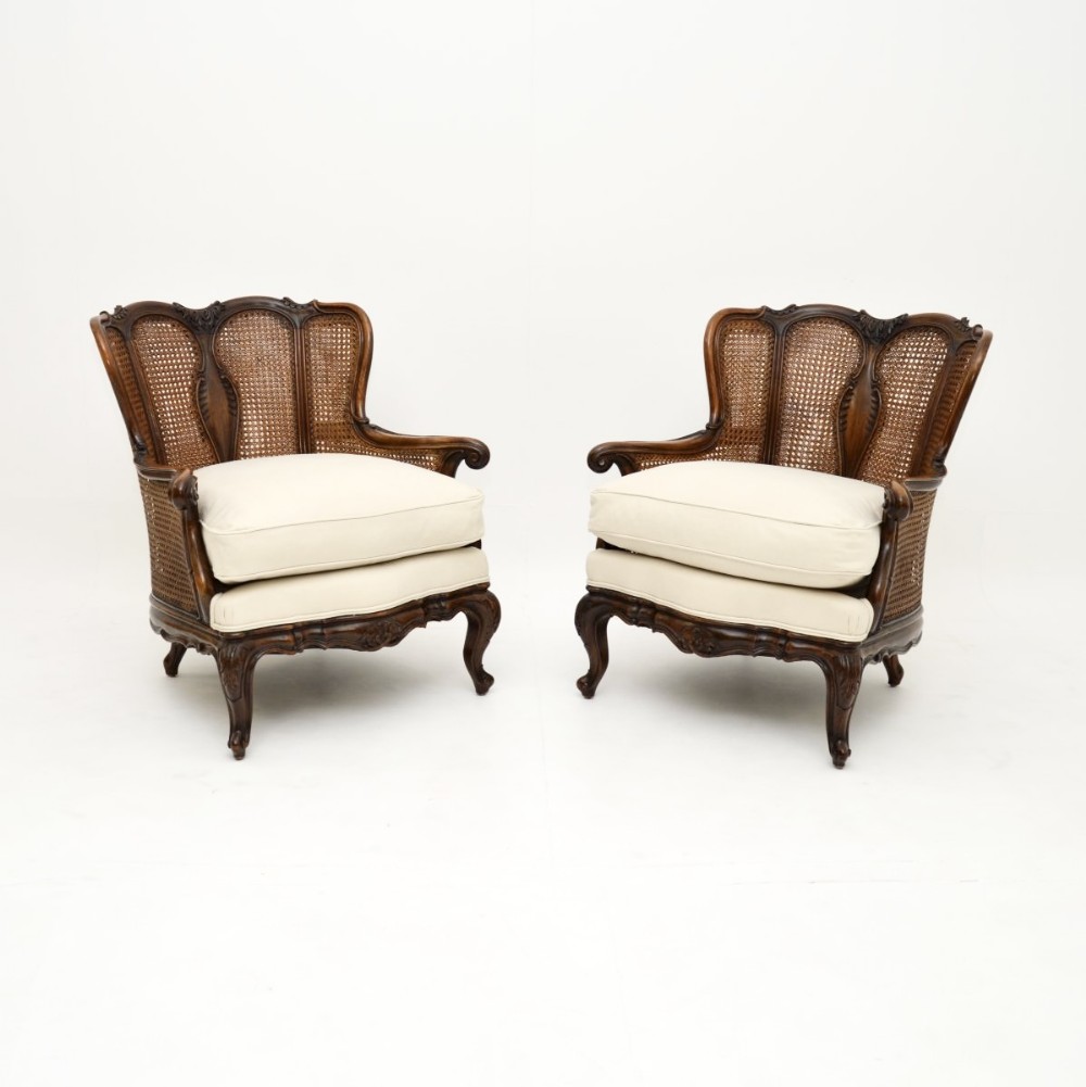 Pair of Antique French Walnut Bergère Armchairs
