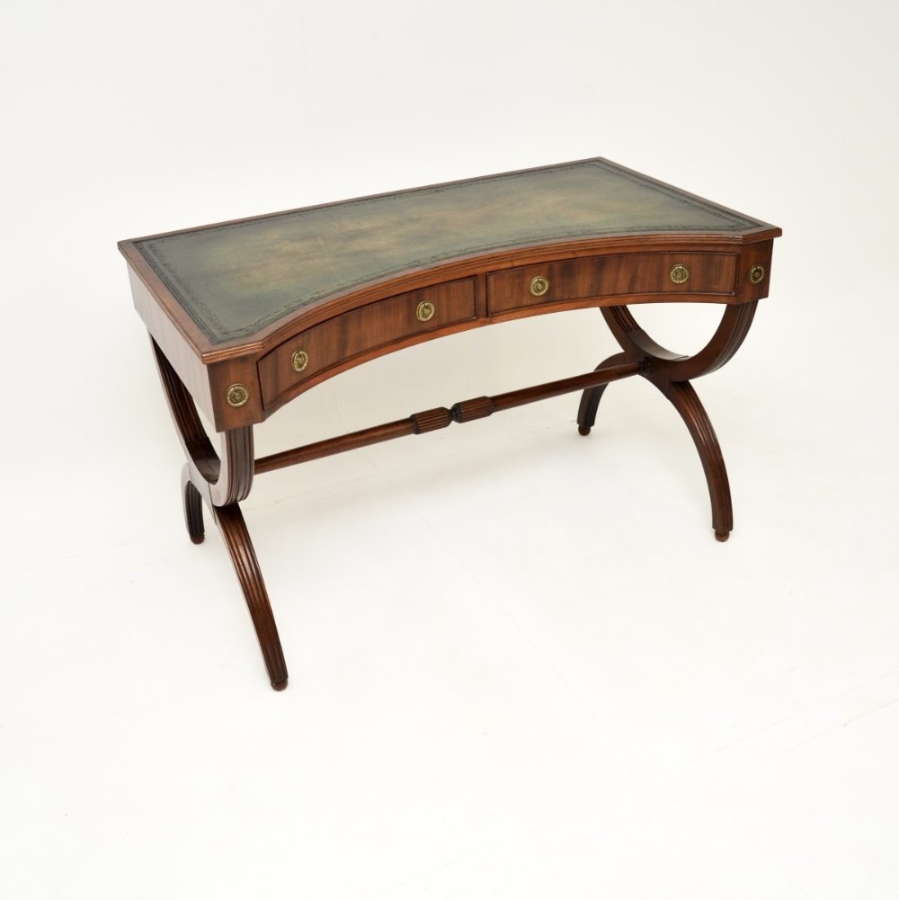 Antique Mahogany Concave Leather Top Desk

