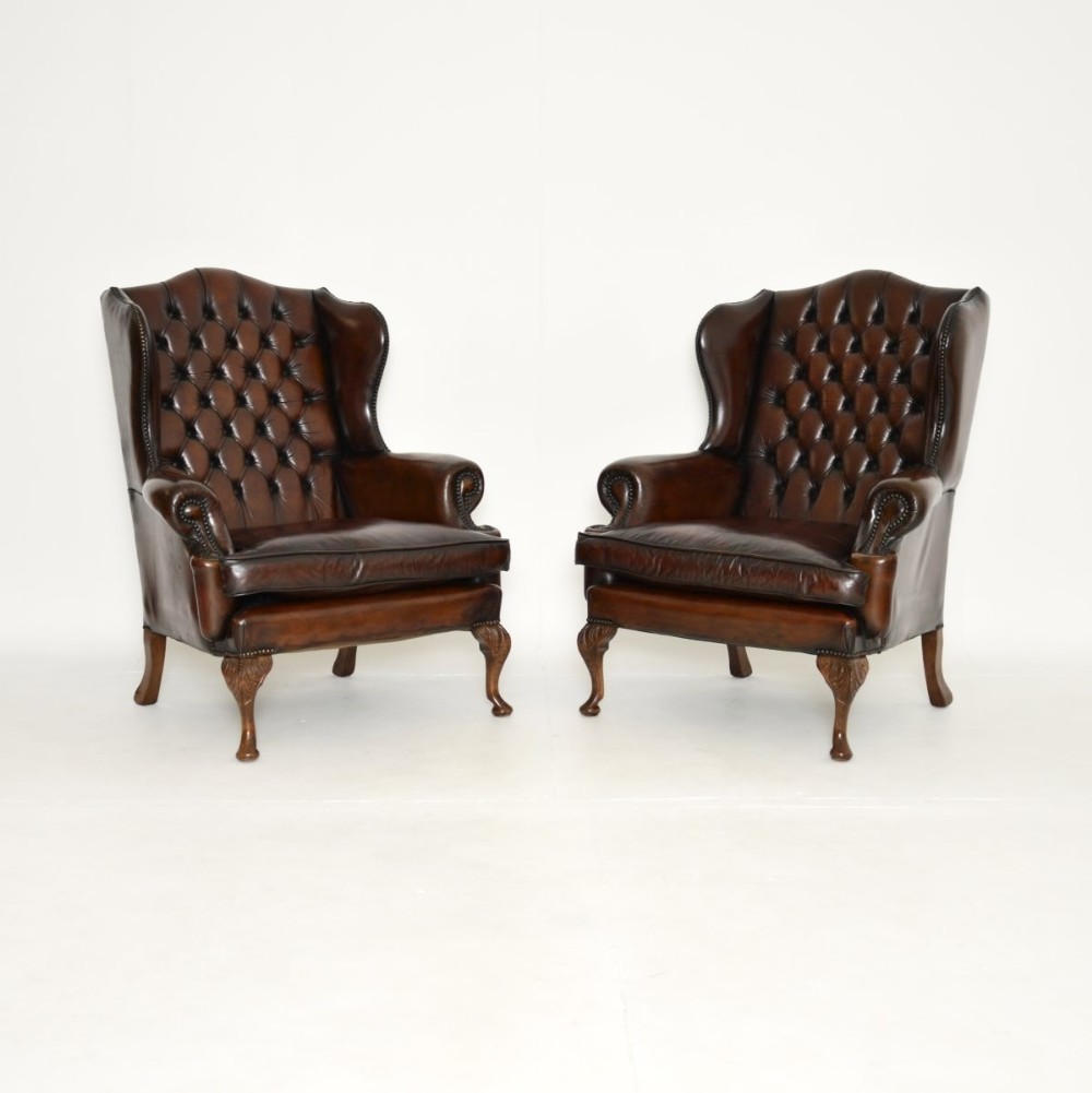 Pair of Antique Leather Wing Back Armchairs
