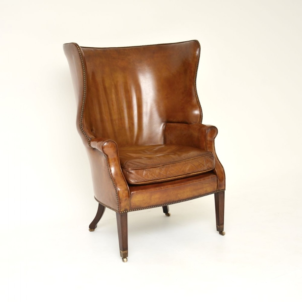 Antique Leather Barrel Back Wing Armchair
