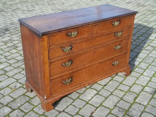 A Georgian 18th Century Oak and Walnut Cross Banded Chest of Drawers of Small Dresser Base Size