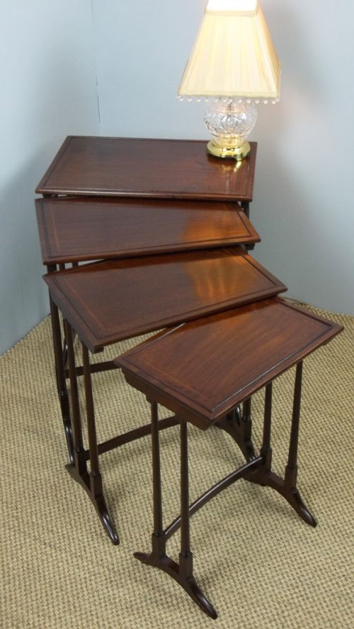 Antique Nest Set of Four Mahogany Stacking Wine Lamp Occasional Side Quartetto of Tables. C1900.